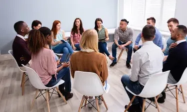 Social Worker Leading Group Discussion